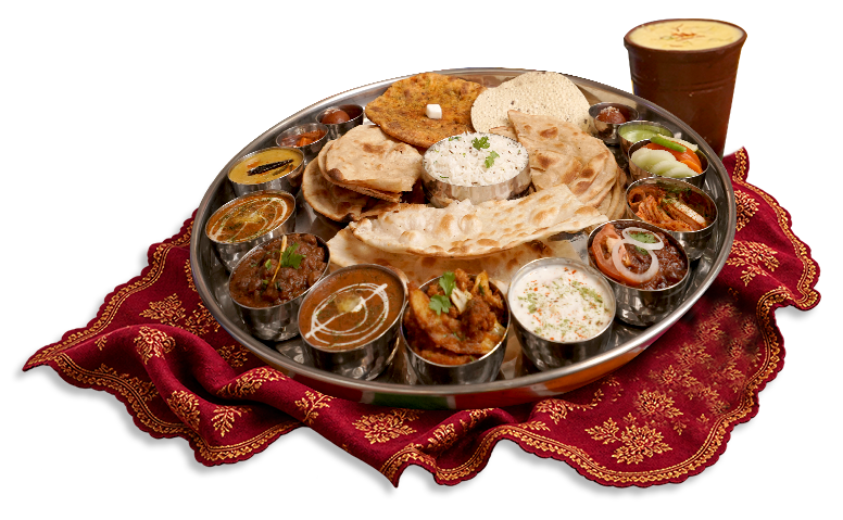 Traditional Punjabi thali with Indian breads, curries and accompaniments